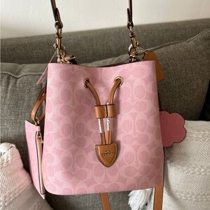 coach powder pink rowan bucket bag